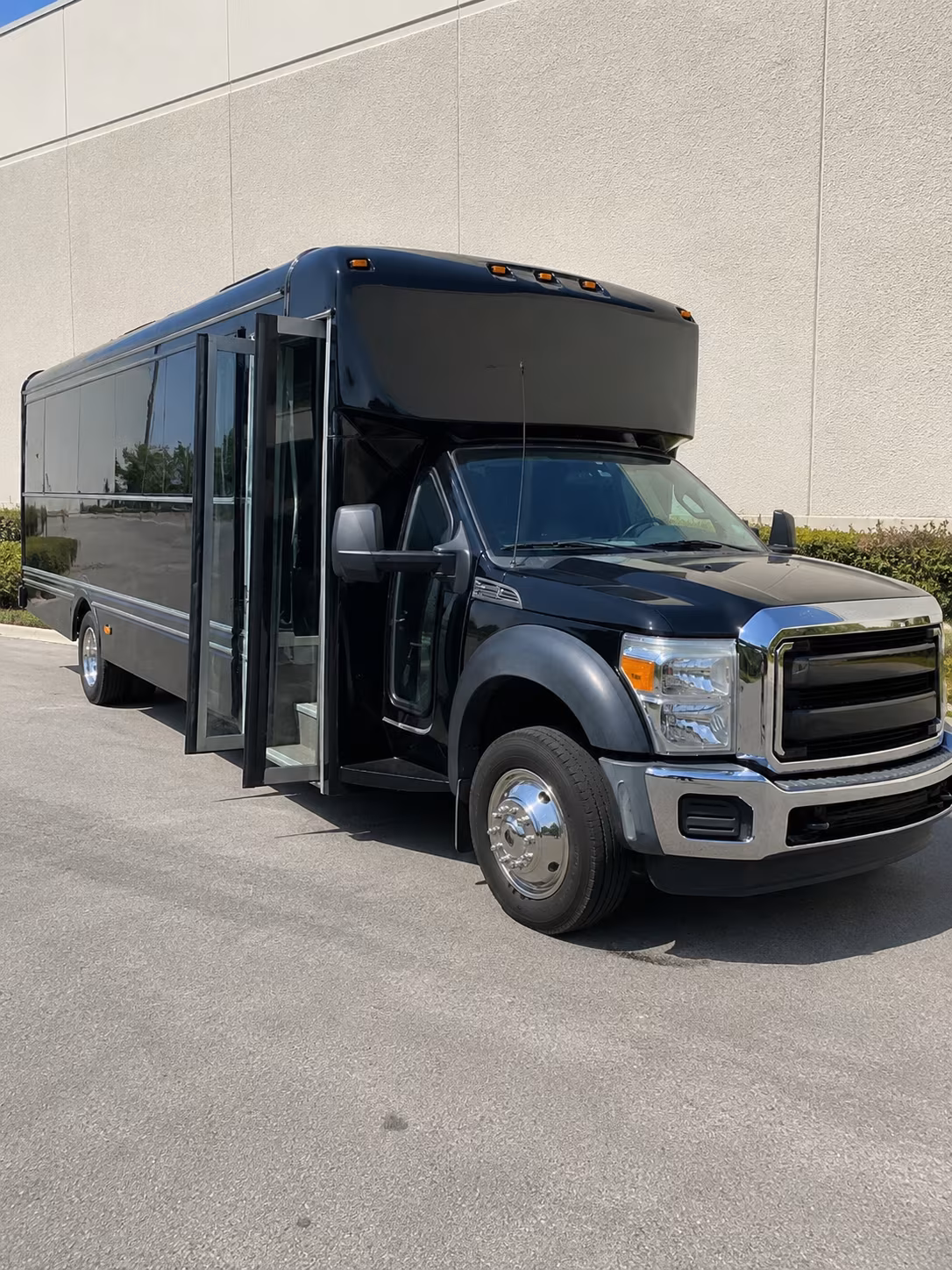 Orange Private Event Transportation party bus exterior