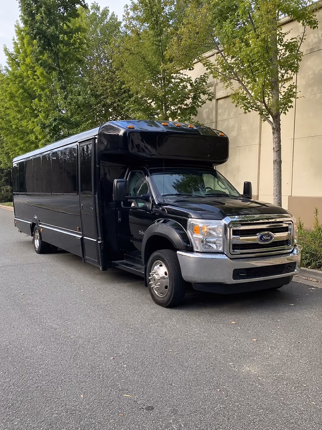 Orange Private Event Transportation party bus exterior