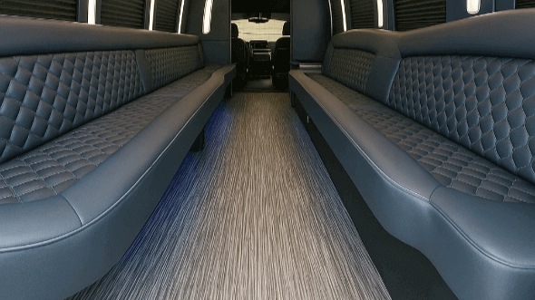 orange 25 passenger party bus interior